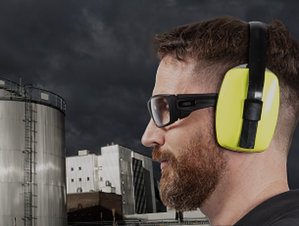 Worker is wearing Ugly Fish Cyclone Plastic Matt Navy Blue Prescription Safety Glasses