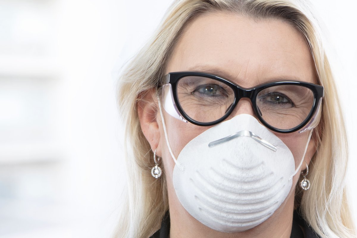 Healthcare worker wearing protective ugly fish lynx prescription safety glasses