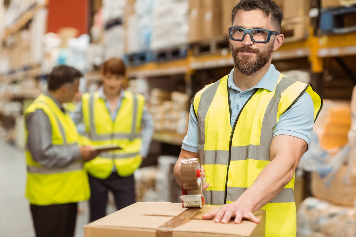 Worker is wearinf Ugly Fish Jackal Plastic Crystal Smoke Prescription Safety Glasses